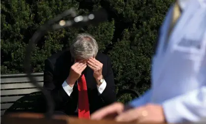  ?? Photograph: Erin Scott/Reuters ?? Meadows rubs his head as doctors speak about Trump’s health in Bethesda on 4 October.