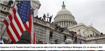  ??  ?? Supporters of U.S. President Donald Trump scale the walls of the U.S. Capitol Building in Washington, D.C. on January 6, 2021.