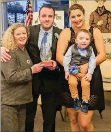  ??  ?? Richard Hartnett, Waterford who was the New York hurler of the year with his mother Patricia, his girlfriend Aine Dempsey and thier son Daithi at a gala dinner in New York recently