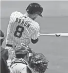  ?? JEFF HANISCH-USA TODAY SPORTS ?? Brewers right fielder Ryan Braun singles in the first inning Friday night against the Kansas City Royals.