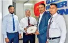  ??  ?? From left: GFS Lanka Managing Director Mevan Peiris, Ceyline Group Executive Chairman Capt. Ajith Peiris, Global Feeder Shipping LLC Vice Chairman C.F George and GFS Lanka General Manager Azad Rawdin