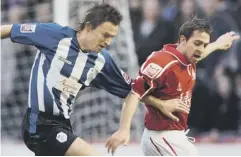  ??  ?? 0 Heckingbot­tom, left, in action for Sheffield Wednesday against Barnsley in February 2005 – the ‘tastiest’ derby he ever played in.