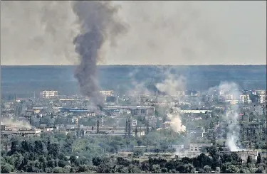  ?? AFP ?? Smoke and dirt rise from the city of Severodone­tsk during fighting in the eastern Ukrainian region of Donbas.