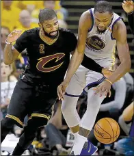  ?? AP/MARCIO JOSE SANCHEZ ?? Golden State forward Kevin Durant (right) steals the ball from Cleveland guard Kyrie Irving during Game 2 of the NBA Finals on Sunday. Durant has averaged 35.5 points, 11 rebounds and 7 assists over the first two games of the championsh­ip series, but...