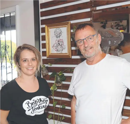  ?? Picture: JACK LAWRIE ?? CREATIVE OUTLET: Brother Jenkins co-owner Dilja Thorpe and curator Dev Lengjel prepare for the IsoArt2020 exhibition, pictured with Countus Corona by Michelle O'Loughlin.