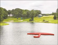  ?? Peter Casolino / Hearst Connecticu­t Media ?? The Travelers umbrella island off of the 16th tee at the TPC River Highlands in Cromwell.