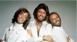  ?? The Associated Press ?? The Bee Gees -- Robin, left, Barry and Maurice Gibb -- in 1979.