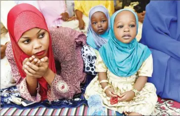  ?? PIUS UTOMI EKPEI/AFP ?? Muslim faithfuls pray to celebrate Eid al-Adha festival in Lagos, on September 24, 2015.