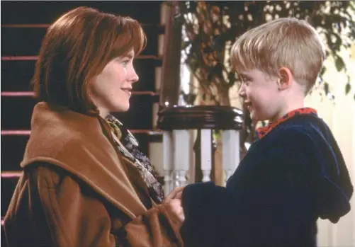  ??  ?? Catherine O’Hara and Macaulay Culkin in a scene from “Home Alone”