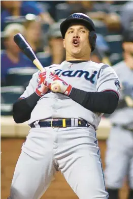  ?? MIKE STOBE/GETTY ?? The Marlins’ Avisail Garcia reacts to a called strike in the fifth inning Friday against the Mets at Citi Field in New York City.