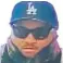  ??  ?? The man dubbed the “L.A. Bandit” was wearing a blue L.A. Dodgers baseball hat and dark sunglasses.