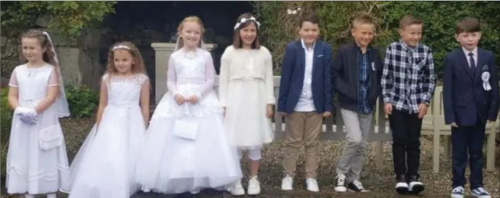  ??  ?? Pupils from Kilmacanog­ue NS who received their First Holy Communion at St Mary’s church in Enniskerry.