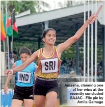  ??  ?? Amasha, claiming one of her wins at the recently concluded SAJAC - FIle pic by Amila Gamage