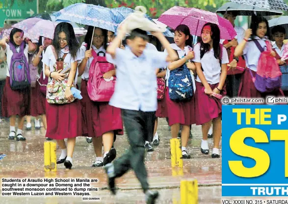  ?? EDD GUMBAN ?? Students of Araullo High School in Manila are caught in a downpour as Domeng and the southwest monsoon continued to dump rains over Western Luzon and Western Visayas.