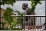  ?? KEITH SRAKOCIC — THE ASSOCIATED PRESS ?? The statue of Public Broadcasti­ng Service’s Fred Rogers, the host of children’s program “Mister Rogers’ Neighborho­od,” is visible behind the fencing in the closed-off park area where the statue is located in Pittsburgh.