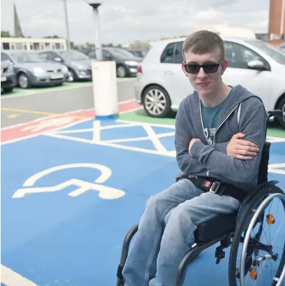  ??  ?? Oliver Smith in one of the disabled parking spots at Regent Arcade