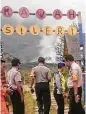  ?? Binsar Bakkara / AP ?? Rescue workers stand at the path to the Sileri Crater after it erupted.