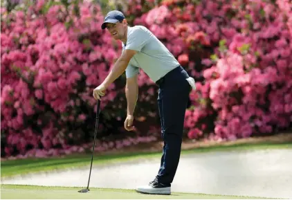  ??  ?? In this April 8, 2019, file photo, Rory McIlroy, of Northern Ireland, watches his putt on the 13th hole during a practice round for the Masters golf tournament in Augusta, Ga.