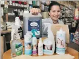  ?? JOHN KENNEY THE GAZETTE ?? Stephanie Guico is marketing coordinato­r at the Co-op La Maison Verte, which sells a variety of environmen­tally friendly cleaning products.
