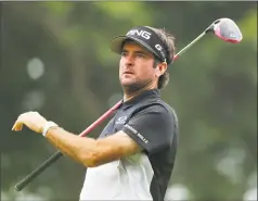  ?? Tim Bradbury / Getty Images ?? Bubba Watson plays his shot from the 18th tee during the third round of the Travelers Championsh­ip at TPC River Highlands on Saturday.