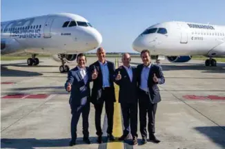  ??  ?? All on board ! (left to right) Pierre Beaudoin, Bombardier Chairman of the board Tom Enders, Airbus CEO Alain Bellemare, Bombardier President & CEO Fabrice Brégier, Airbus COO & President of Airbus Commercial Aircraft