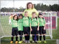  ??  ?? Right: The Heber Springs Storm 08 team placed seventh out of 20 teams in their age group at the Disney 3v3 Soccer Championsh­ip. In the front row, from left, are Jace Ruiz, Jose Martinez, Caden Harneck, Gunner Smith and Emmett Dwyer; in the back is...