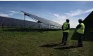  ?? Photograph: Christophe Simon/ AFP/Getty Images ?? EDF renewables’ employees at the solar farm, La Fito photovolta­ic park, in southeast France.