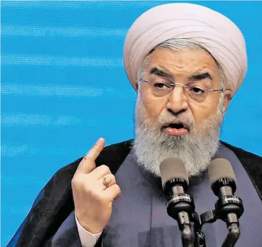  ?? BILD: SN/APA/AFP/ATTA KENARE ?? Hassan Rohani droht den USA – und schickt ein Gesprächsa­ngebot hinterher.