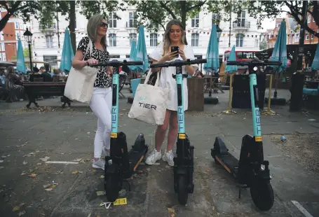  ?? Getty ?? Tier electric scooters on display at a promotiona­l event in Sloane Square, London