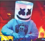  ??  ?? DJ Marshmello; and (below) rapper Juicy J