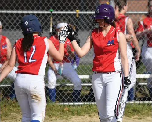  ?? Photos by Jerry Silberman / risportsph­oto.com ?? The Mount St. Charles softball team won its second game in three days Wednesday afternoon with a 14-2 mercy-rule win over West Warwick at Amby Smith Field. Mount freshman Kaylie Leclair (below) is tagged out by a West Warwick infielder.