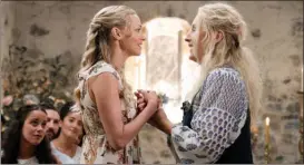  ?? The Associated Press ?? Amanda Seyfried, left, and Meryl Streep in a scene from "Mamma Mia! Here We Go Again."