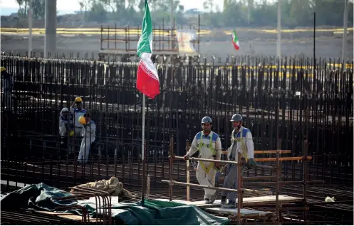  ??  ?? Image officielle, prise le 10 novembre 2019, des travaux de la centrale de Bouchehr pour la constructi­on des réacteurs 2 et 3.