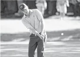  ??  ?? Jordan Spieth chips to the second green during a practice round for the PGA Championsh­ip at Baltusrol Golf Club in Springfiel­d, N.J., Tuesday.