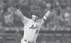  ?? JIM MCISAAC/GETTY ?? Mets rookie Pete Alonso rounds the bases Saturday after hitting his 53rd home run of the season, breaking Aaron Judge’s rookie record.