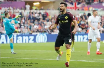  ?? — Reuters ?? Manchester City’s Sergio Aguero celebrates scoring their second goal.