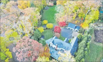  ?? Contribute­d photo ?? 25 Grove Lane, Greenwich, is a five-bedroom single-family home on 2.5 acres. Houlihan Lawrence is the listing brokerage; the asking price is $3.9 million.