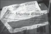  ?? Genaro Molina Los Angeles Times ?? THE TIMES could fetch as much as $400 million if it is sold by Tribune Co., according to industry insiders. Above, papers in a news rack in Mar Vista in 2011.