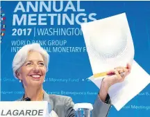  ?? JOSE LUIS MAGANA/AP ?? Atenção. Christine Lagarde alerta para riscos financeiro­s