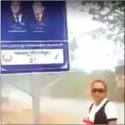  ?? FACEBOOK ?? Kampong Speu native Sam Sokha is seen in a screenshot of a video showing her throwing a sandal at a Cambodian People’s Party billboard last April.