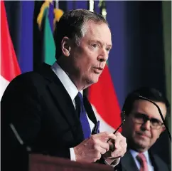  ?? MANUEL BALCE CENETA / THE ASSOCIATED PRESS FILES ?? U.S. Trade Representa­tive Robert Lighthizer, left, met with Mexico’s Secretary of Economy Ildefonso Guajardo Villarreal, right, on Thursday.