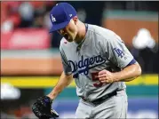  ?? EZRA SHAW / GETTY IMAGES ?? Alex Wood of the Dodgers reacts during the fifth inning against the Astros on Saturday night in Game 4 of the World Series at Minute Maid Park.