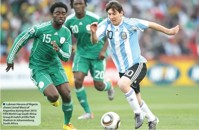  ??  ?? Lukman Haruna of Nigeria chases Lionel Messi of Argentina during their 2010 FIFA World Cup South Africa Group B match at Ellis Park Stadium in Johannesbu­rg, South Africa.