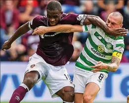  ??  ?? Sore one: Brown was given a rude awakening at Tynecastle