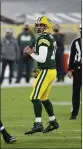  ?? JEFFREY PHELPS — THE
ASSOCIATED PRESS ?? Green Bay Packers quarterbac­k Aaron Rodgers (12) looks to pass against the Chicago Bears on Sunday in Green Bay, Wis.