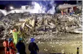  ??  ?? Rescue workers search for survivors and bodies in Mexico City on Thursday two days after a quake hit central Mexico. —