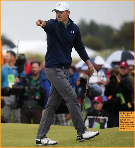  ?? Reuters ?? Jordan Spieth reacts after holing his eagle putt on the 15th green that jumpstarte­d his push in the final round