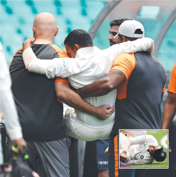  ?? Picture: GETTY IMAGES ?? Prithvi Shaw is helped from the field after an ankle injury yesterday left the teen sensation devastated and out of the first Test.