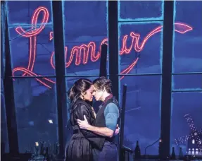  ?? MATTHEW MURPHY ?? Satine (Karen Olivio) and Christian’s (Aaron Tveit) tragic romance gets a modern update in the stage version of “Moulin Rouge!”