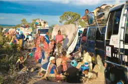  ?? DOCTORS WITHOUT BORDERS ?? People displaced by the conflict in Cabo Delgado, Mozambique, wait Thursday to be transporte­d to Palma, a coastal town attacked earlier this year.